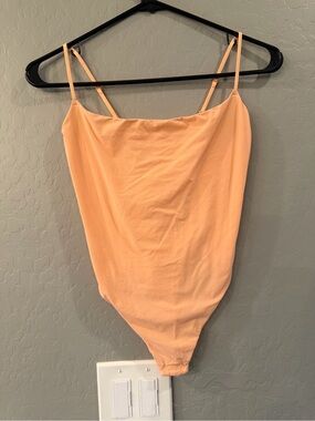SKIMS Peach Spaghetti-Strap Bodysuit with Scoop Neck